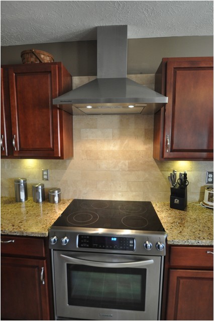 new venetian gold granite countertop with tile backsplash contemporary kitchen indianapolis