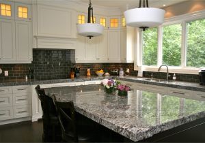 Alaska White Granite with Gray Cabinets Lennon Granite Completed with Gray Subway Tiles and Cupboard Back